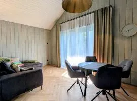 PUTNI Resort apartamentu māja