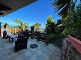 Bungalow charmant à Les Trois Bassins avec vue sur mer