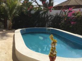 Bright apartment with sea view and garden in Ouoran, 100 m², khách sạn ở Ouoran