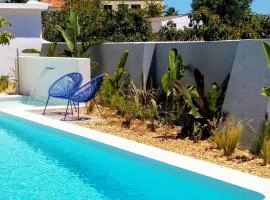 Modern apartment in Estói with shared pool.