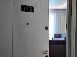 SunKissed Sky Apartment - Qerret Golem - New Modern
