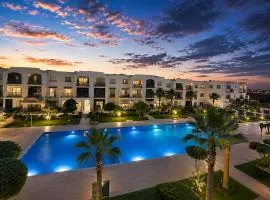 Premium Apartment with Pool View & Private Garden