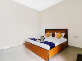 SPOT ON 42401 hotel Divine farm, מלון באליגר