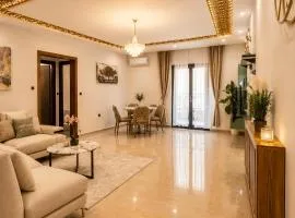 Charming 2-Bedroom Apartment with Garden View Balcony