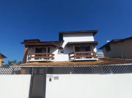 Casa Master Pé na Areia com Piscina Wifi, hotel v destinaci Bertioga
