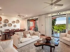 Spacious 4BR Condo with Partial Ocean View - Bougainvillea - Reserva Conchal