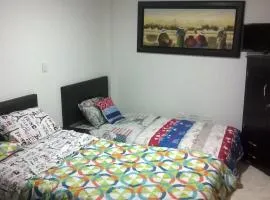 Apartaestudios El Cable, hotel near La Nubia Airport - MZL, 