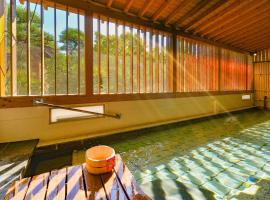 Ooedo Onsen Monogatari Hotel Shinko, מלון בFuefuki