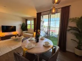 Oaks Valley Retreat with 2 Balconies, Gym, Parking & Laundry 214