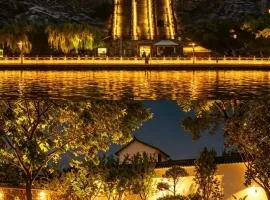 Floral Hotel Chunyuan Longmen Grottoes Northwest Service Center Garden Pond Fishing Fruit Trees Pet Friendly Free Parking Tea House Chess Room Movie Team Building