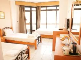 Gaddis Hotel, Suites and Apartments