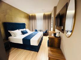 Hotel Shopi Residence，愛爾巴桑的飯店
