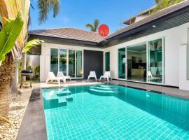 Pool Villa Pattaya Jomtien Beach - Palm Oasis C7, מלון בחוף ג'ומטיין