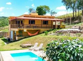 Sitio Rancho dos Sapos - Ao pé das montanhas de Minas Gerais a uma hora de BH Asfalto