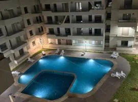 Appartement Garden paradise bouznika 2 2 chambre salon 2 salle bain 4 piscine fibre optique dispo