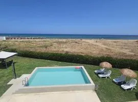 Mariella Rooms beach front with seaview and pool and garden