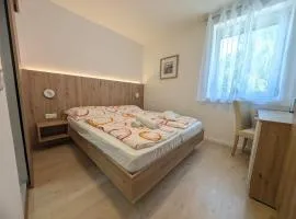 See 4 - Zentral gelegenes Studio in Seenähe mit 2 Bäderkarten