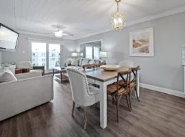 Visit this top floor property located on the no-drive beach with 2 complex pools!