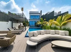 Exclusive 4BR Villa with Assistant Room, Lush Garden & Private Pool Facing Panoramic Sea Views, Al Dana Island, Fujairah by Deluxe Holiday Homes