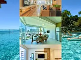 Apartamento em Condomínio Frente-Mar com Piscinas, Jacuzzi Aquecida, Sauna, Academia, Brinquedoteca, 3 quartos Churrasqueira na Sacada, Cozinha Completa e Lazer de Home Club