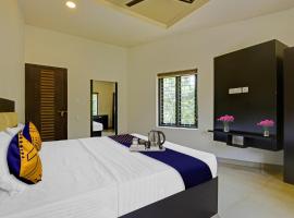 Hotel O Omassery Open stay، فندق في Tāzhekkod