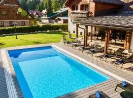 Chalet Schäfer s vyhřívaným bazénem se slanou vodou a saunou