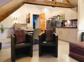 Appartement charmant à La Ferrière-aux-Étangs avec jacuzzi - 42 m²