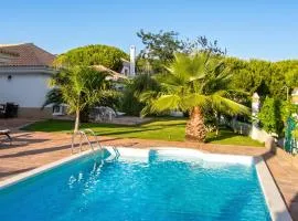 Elegant Villa in Nuevo Portil with Shared Pool
