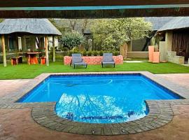 Lion's Den Game Lodge、Hammanskraalのホテル