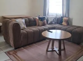Cozy 2 BR with 3 Beds, AC & Hot Shower at Buxton Point Apartments Off RG Road Gate A