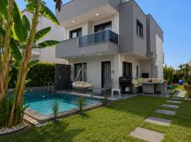 Villa Oyster Park Heated Pool Villa, hotel em Aidim