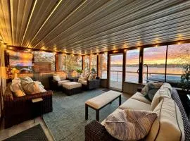 Cozy lakefront Aframe w hot tub & dock
