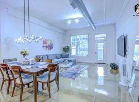 The Stallion #101 - 1BD Modern Loft with Private Patio - Walk to various attractions