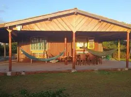 Chalé pé na areia