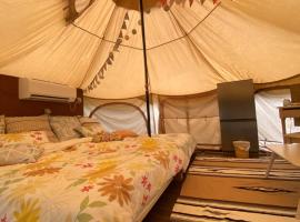 Muribushi-PLUS Gramping TENT, hotel em Motobu