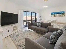Riverfront 2BR Apt with Views, Balcony & Parking