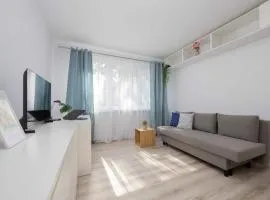 Cozy Apartment with Desk near Potulicki Park by Noclegi Renters