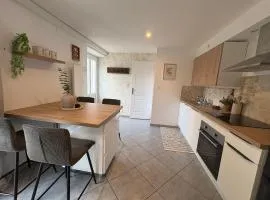Appartement RDC avec terrasse et parking privé
