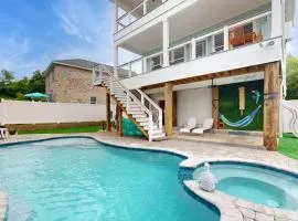 Gorgeous coastal home with private pool and close to beach and golf privileges