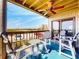 Ideally located coastal condo with Gulf views private balcony & beach access