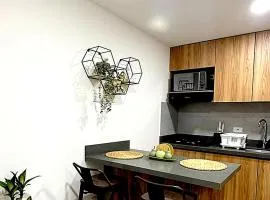 Modern 2BR Apartment with Rooftop Coworking and Gym