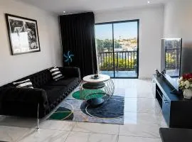 Elegant 1BR Apartment with Balcony