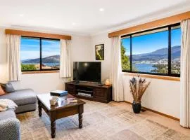 The Lookout with City water and Mountain views