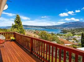 The Lookout with City water and Mountain views