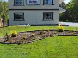 Atrium Inn & Suites