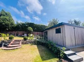 Plas Bach Annexe - Stylish Garden Annexe in the Heart of Prestatyn North Wales Less than 5 mins walk to high street We welcome workers couples solo travellers or small families More info in host details