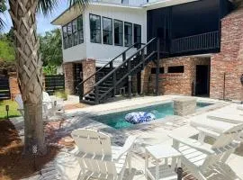 Coastal Luxury with Heated Pool, Putting Green & Game Room