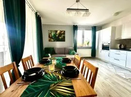 Urban Green Września,Przytulny apartament z parkingiem