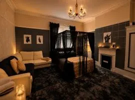 The Belford Black Velvet King Room