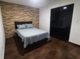 Quarto com banheiro a 3 minutos do centro